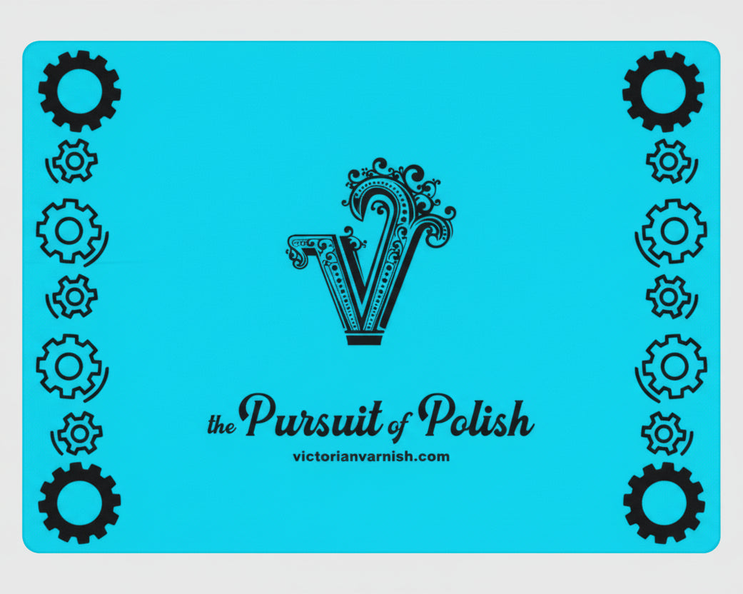 Blue stencil with 'the Pursuit of Polish' logo and decorative 'V' design on a white background
