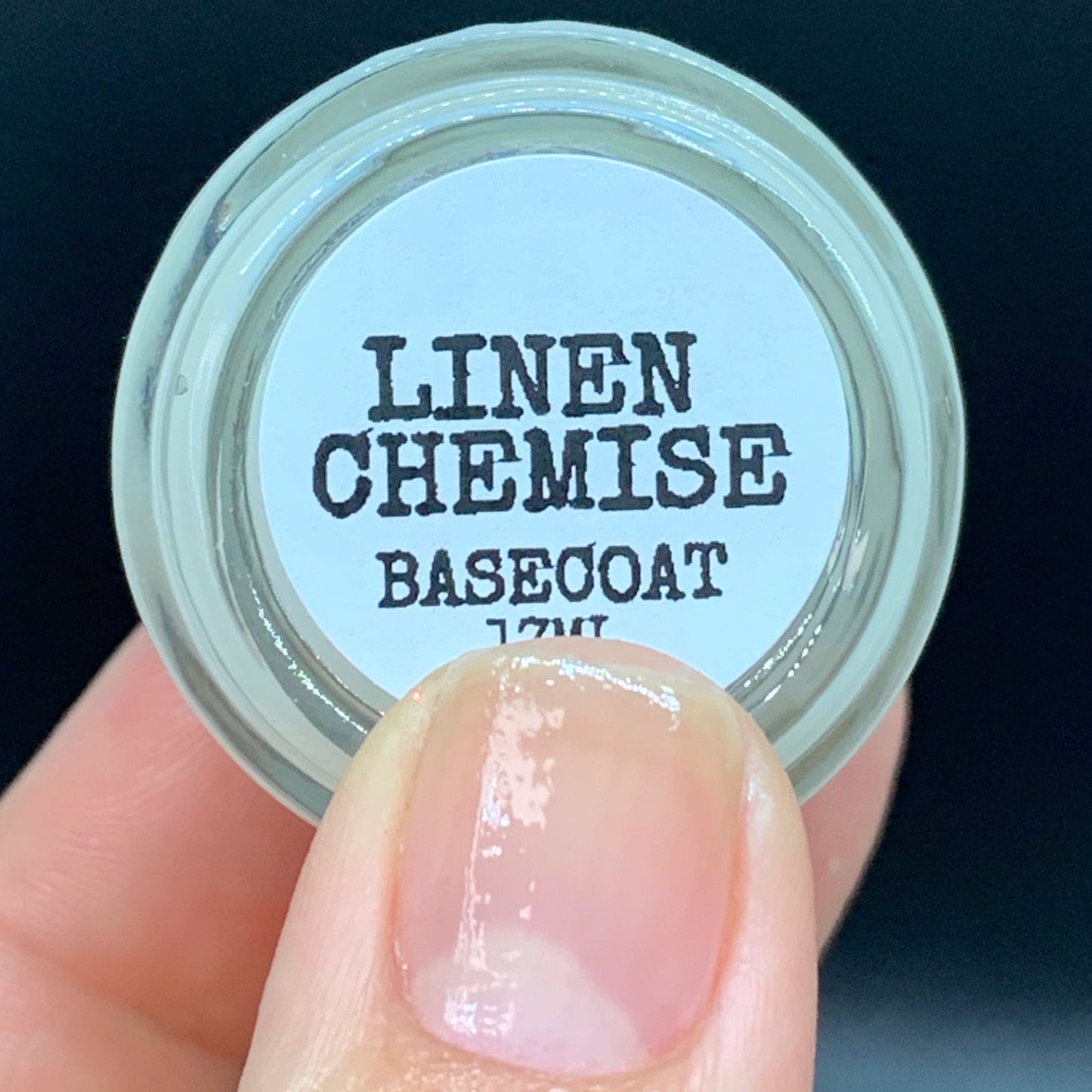 Our Linen Chemise base coat is sticky, light ridge filling, with a light semi satin coverage. It is a great neutral starting point to any mani to protect your natural nails from staining and keep your mani lasting longer. 